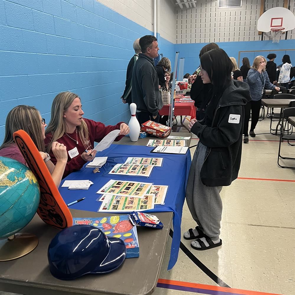 Students participating in the Mad City Money financial literacy simulation at Compass