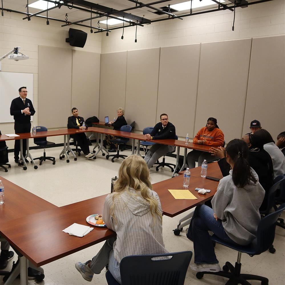 Andover High School students visit with Superintendent Cory McIntyre during student roundtable discussion