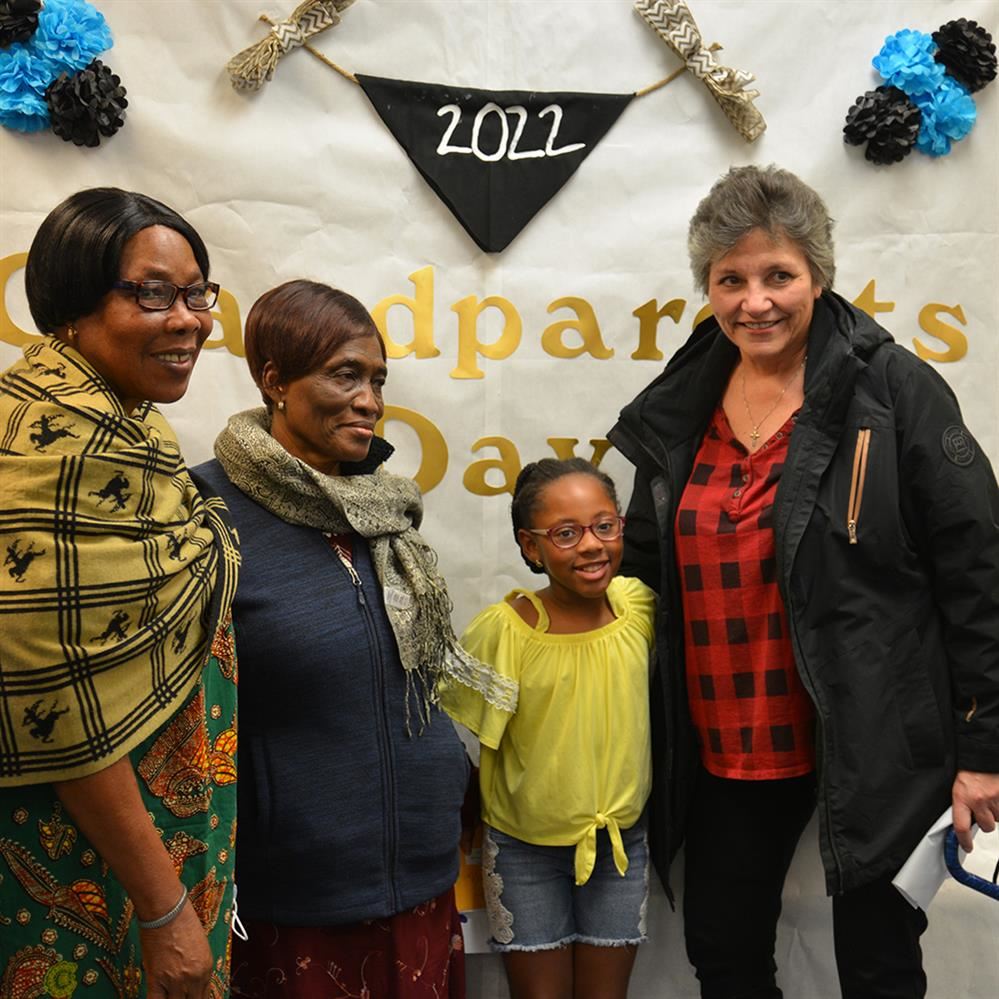 Girl with three women at Ramsey Grandparents Day