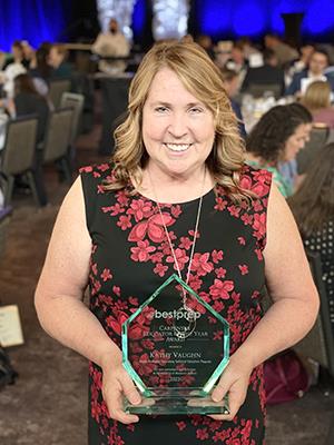 Kathy Vaughn accepts award at BestPrep Luncheon
