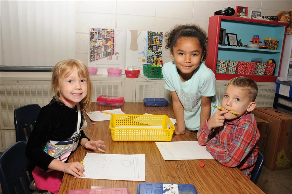  Students work at a table