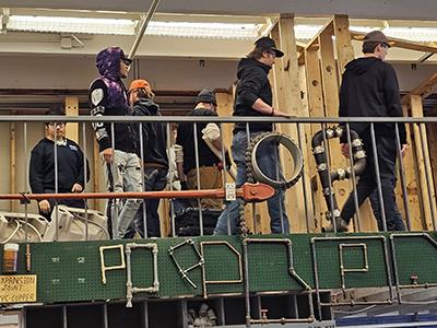 students touring a training space