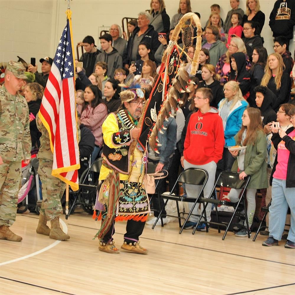  American Indian regalia during a school assembly