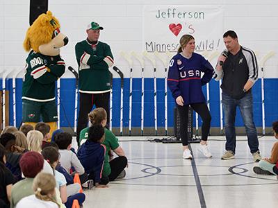 representatives from the Wild speak to students