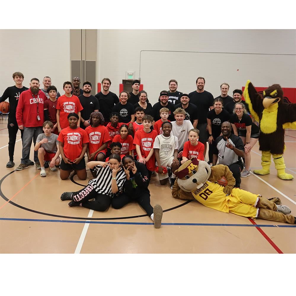 Coon Rapids Middle School students and staff basketball teams
