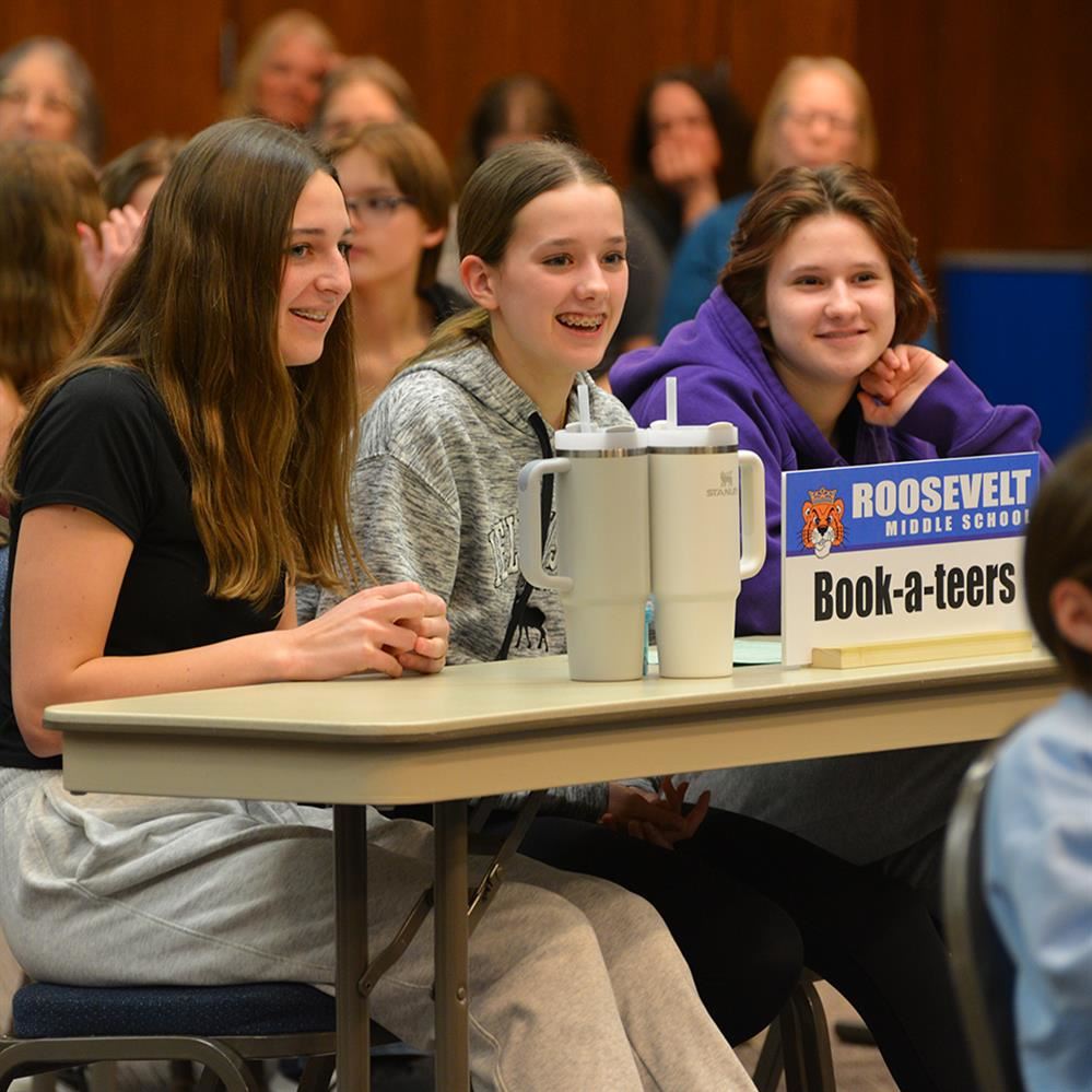  three smiling students from RMS