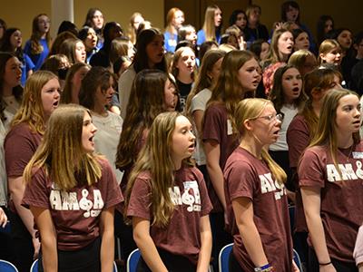 group of students singing 