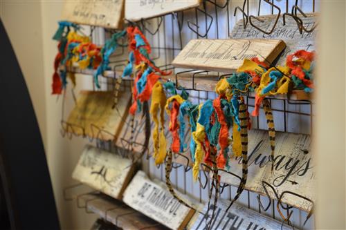 signs and ribbons on display in the shop 