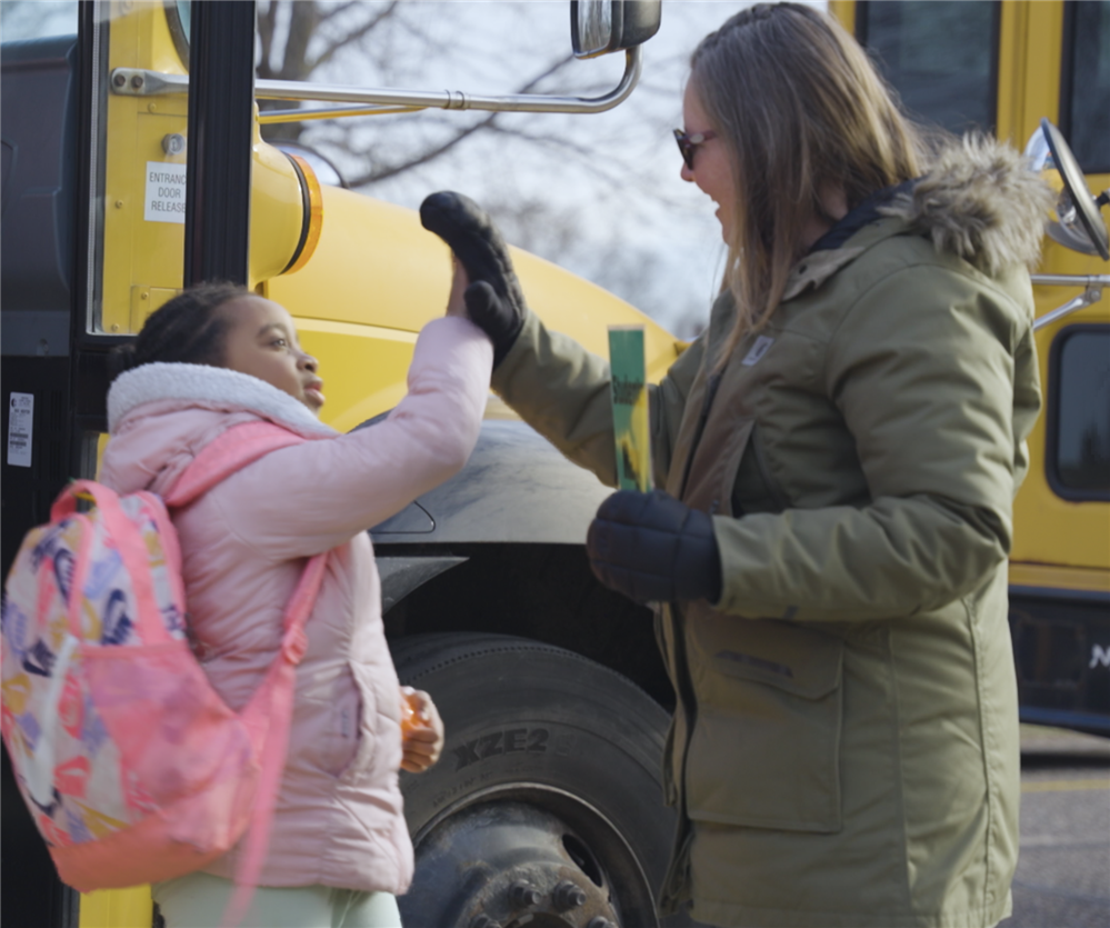  High fives off the bus