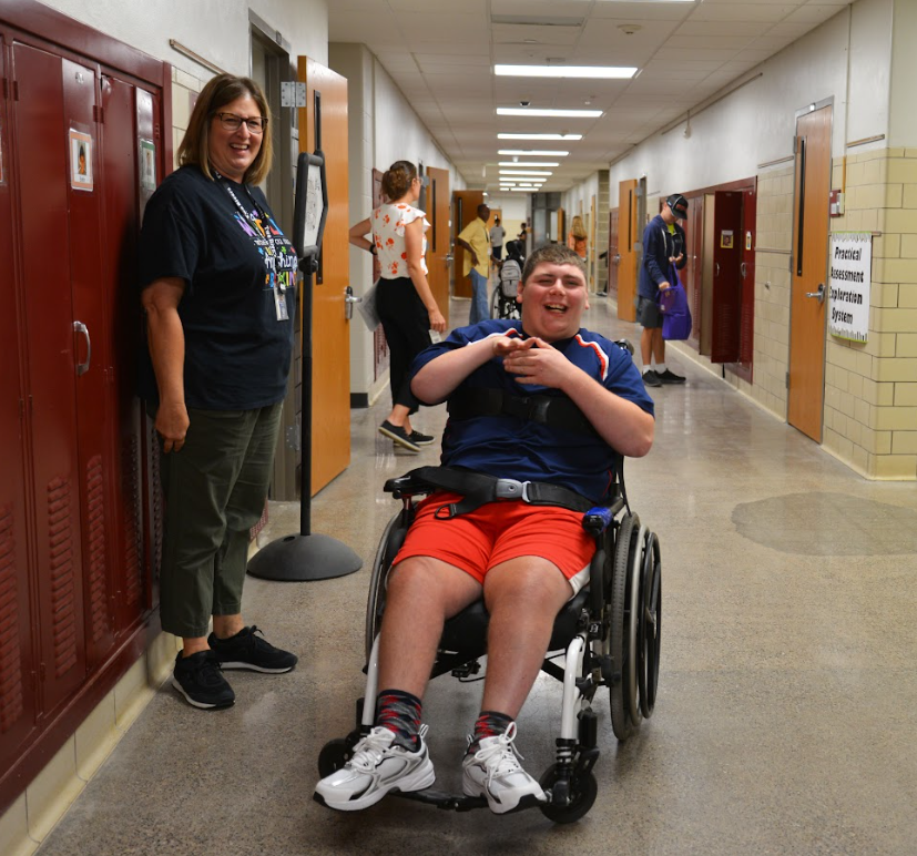 Happy student and staff