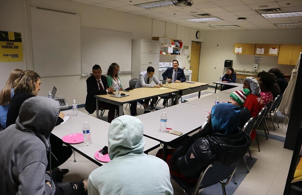 District administrators visit with students at the COMPASS program