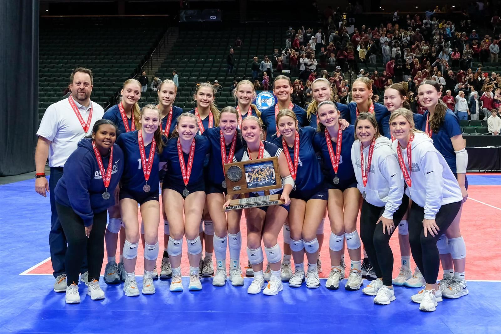 Champlin park High School volleyball pictured with the 2nd place trophy at the Xcel Energy Center on Nov. 9