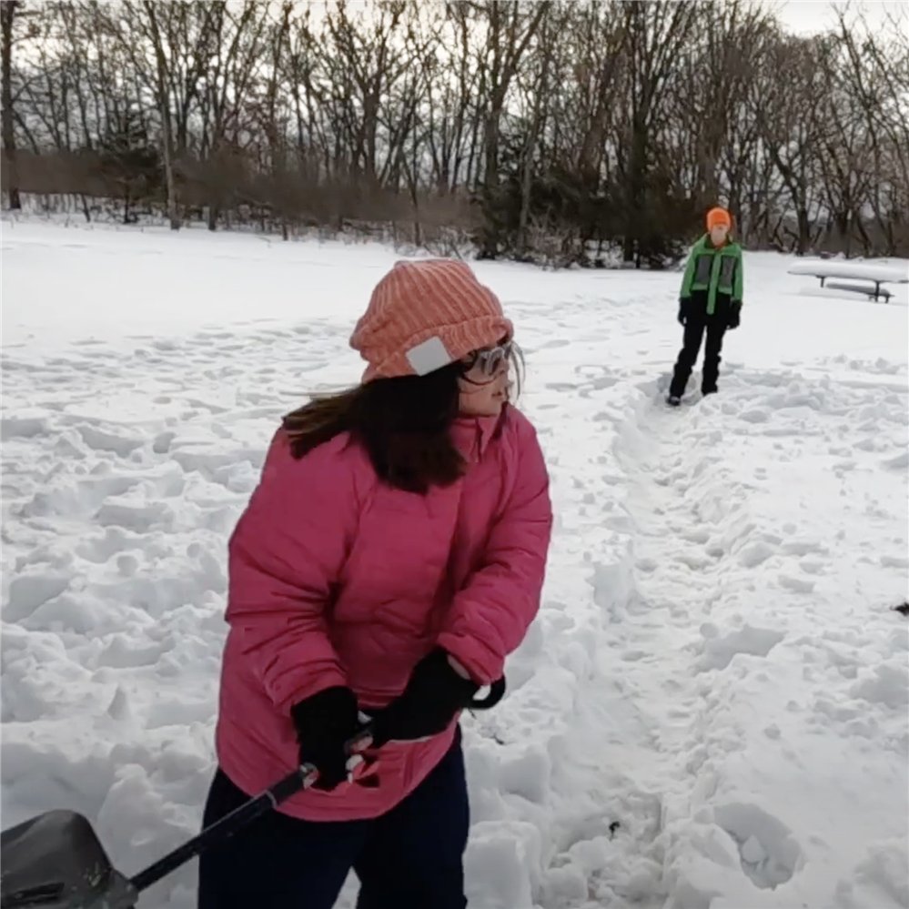 Members of the Champlin Park High School Unified Club play some snow softball on Jan. 18