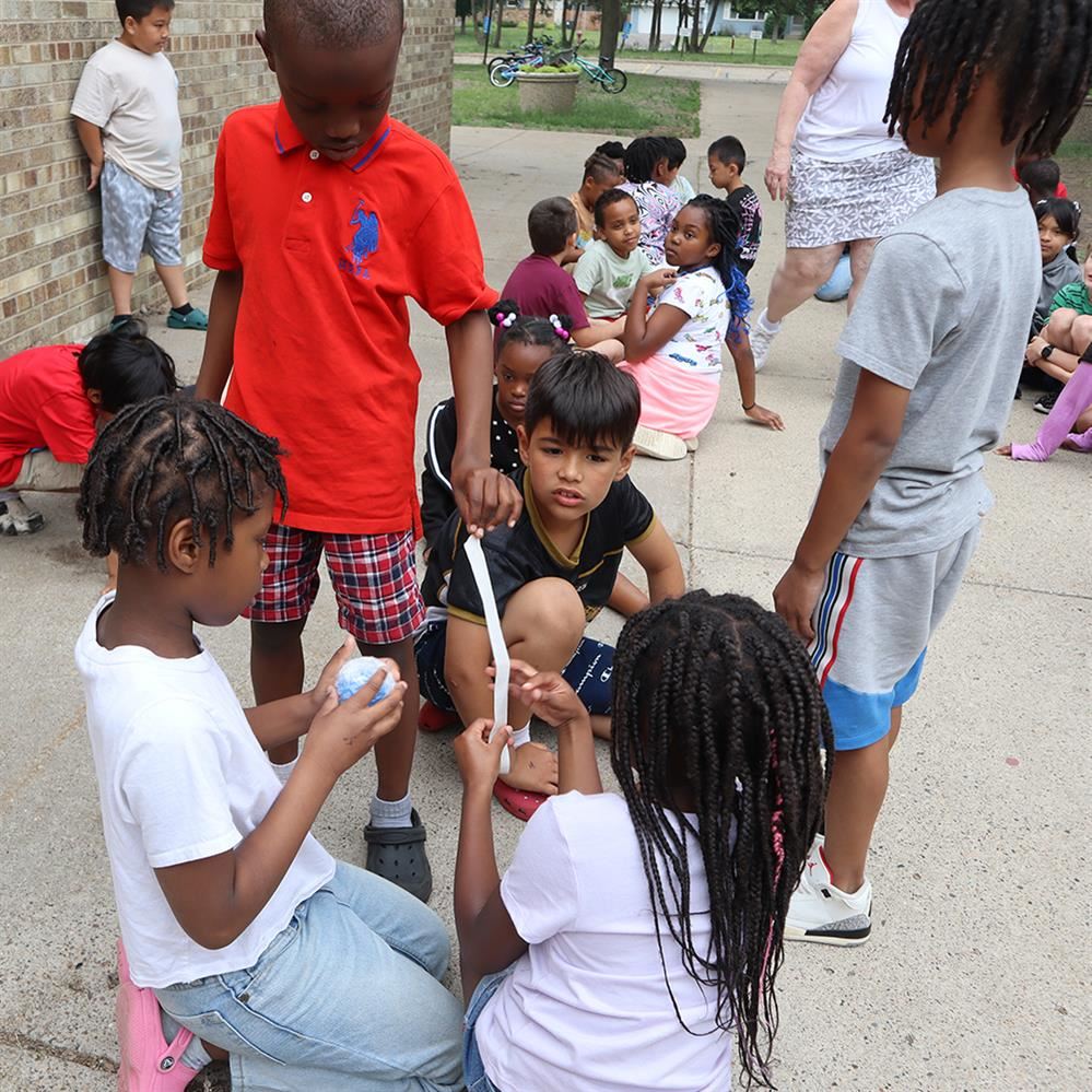  Evergreen Park Elementary students constructing their test space shuttle for an experiment
