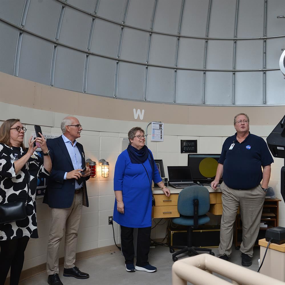 Jackson Middle School observatory coordinator Ron Schmit showing off the observatory to visitors