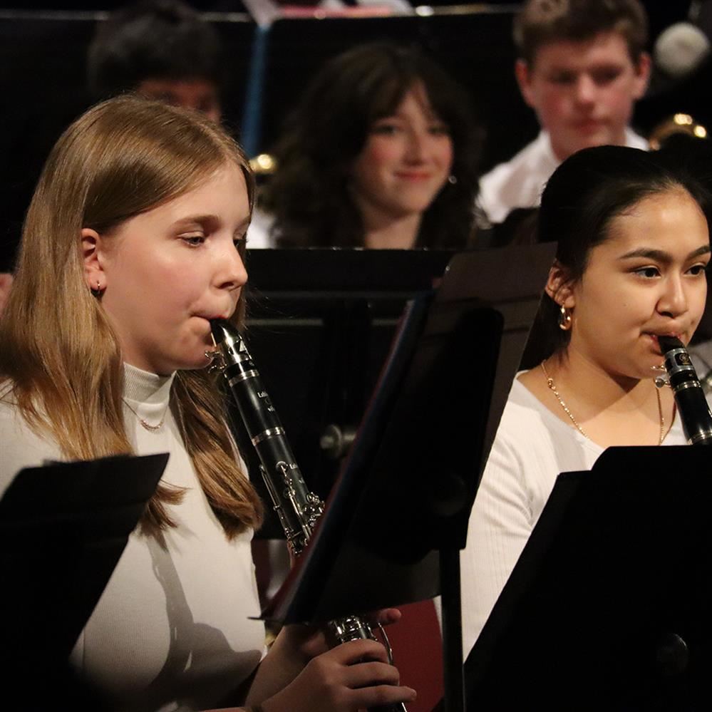  8th grade students perform in honor band concert