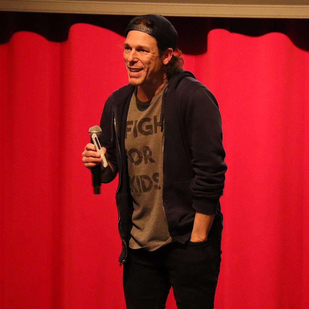  Joe Beckman speaks to the crowd at Coon Rapids High School on Dec. 5
