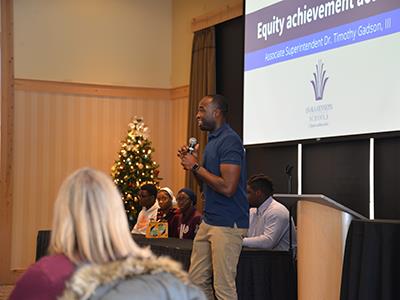 Lomumba Ismail and a group of students from Anoka High school address district administrators on Jan. 20 