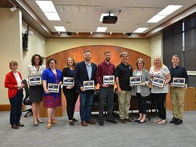 School Board members receive the NAMM Best Communities for Music Education awards