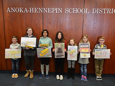 Anoka-Hennepin's poster contest winners were recognized at a transportation department meeting on March 4 