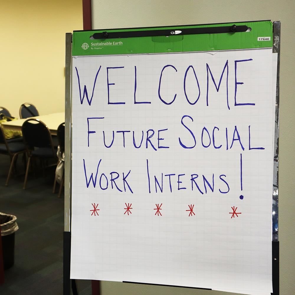 hand-written sign reading Welcome Future Social Workers