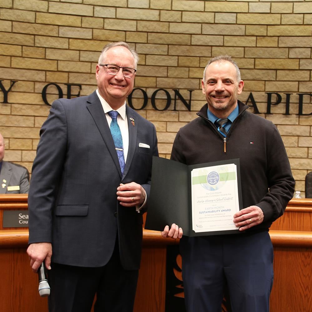  Anoka-Hennepin chief operations officer Greg Cole and Coon Rapids mayor Jerry Koch