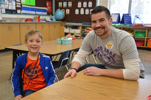 Watchdog volunteer with child