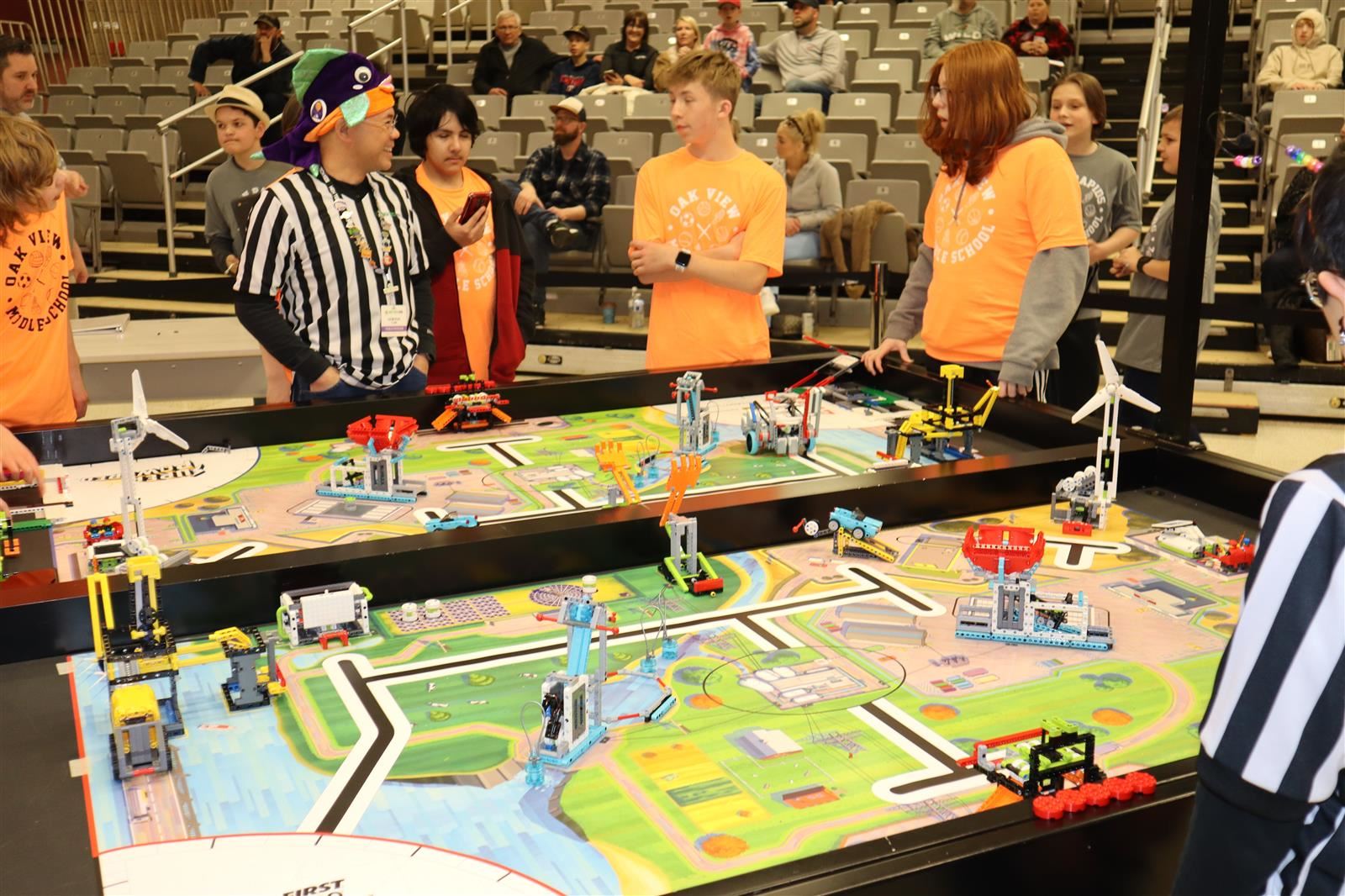 Student participating in robotics tournament