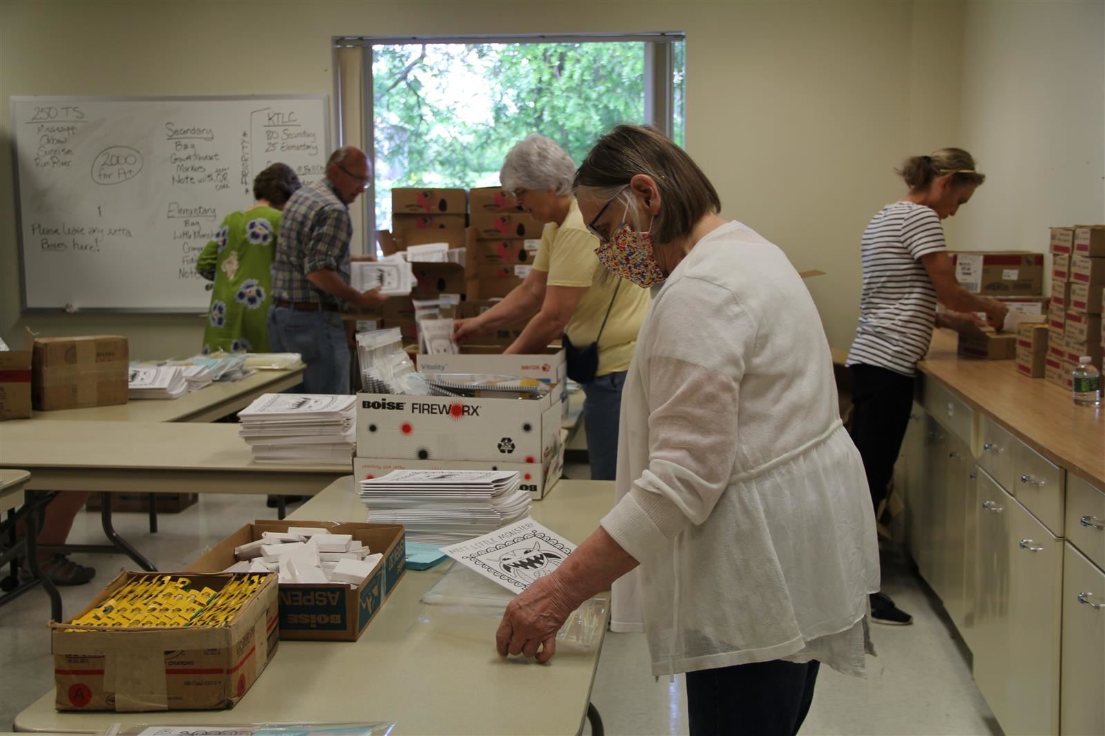 Volunteers packing kits