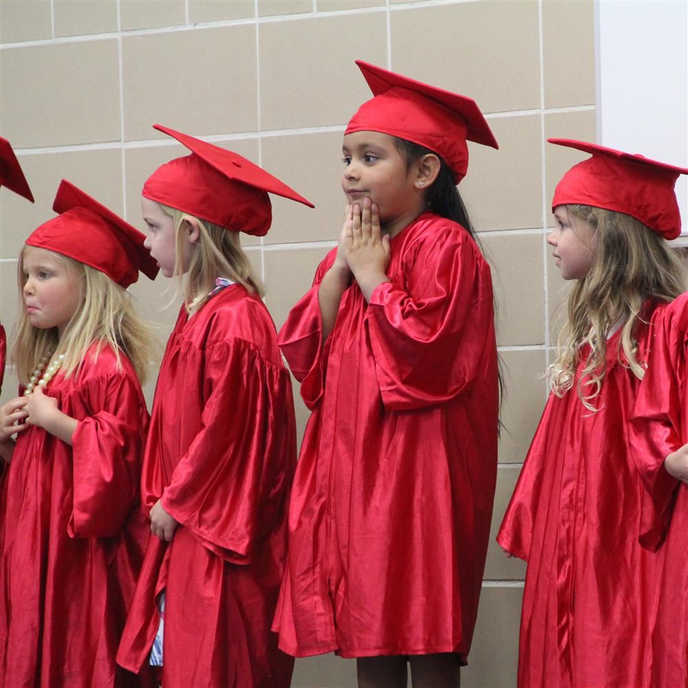  young graduates on stage