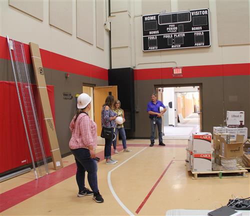 staff touring the gym